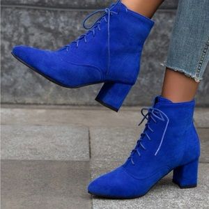 Suede lace up chunky heel boots.